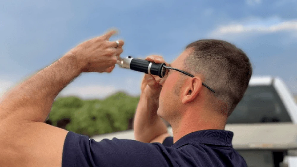 Man using tool outdoors